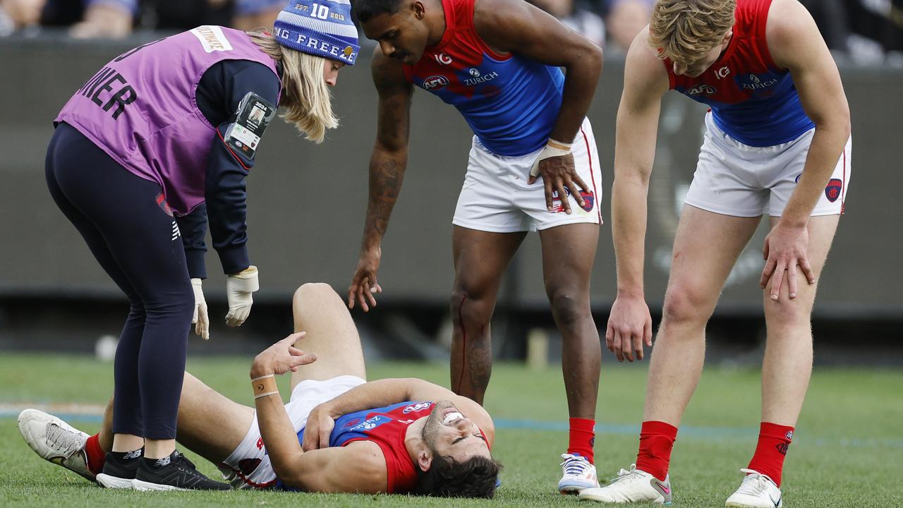 Christian Petracca on the field after the heavy hit. Photo: Michael Klein