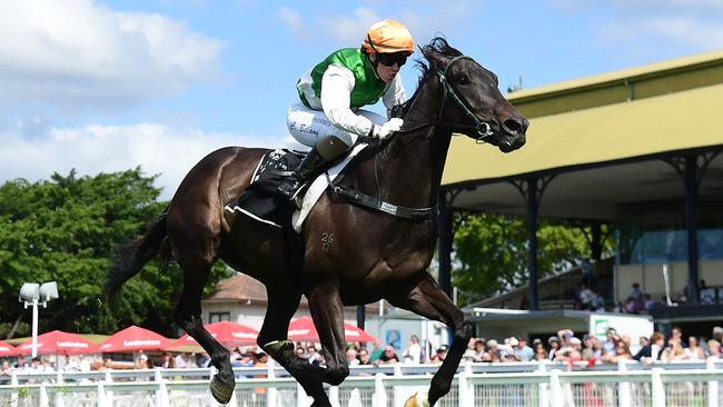 Extra Manners wins at Eagle Farm to give young jockey Courtney Bellamy a breakthrough Saturday win. Picture: Grant Peters/Trackside Photography