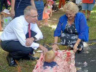 PLAY TIME: Paul Fletcher, Minister for Families and Social Services, and Michelle Landry Assistant Minister with Arlo Cressard (on the pink foam) at Messy Play May. Picture: Jann Houley