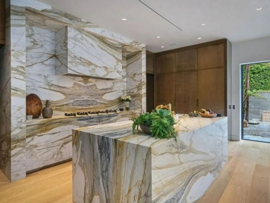 Kitchen clad in rare marble. Picture: Realtor.com