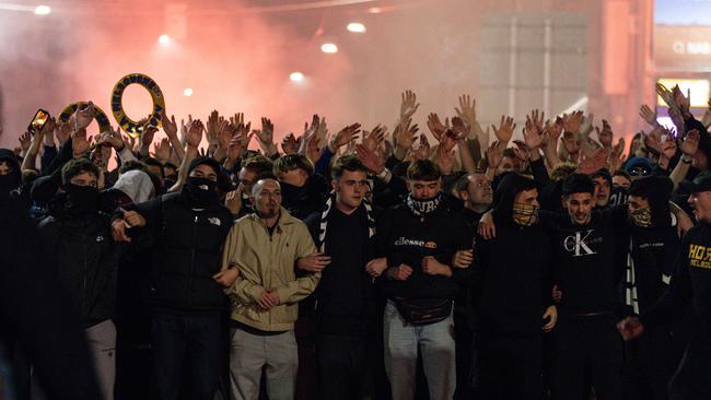 Melbourne Victory football fans march towards AAMI Park. Picture: NewsWire / Diego Fedele
