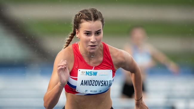 Delta Amidzovski from Albion Park racing the 100m hurdles U17 in a state lead-up event.