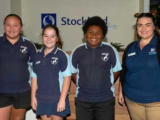 Shahamai Warcon, Rylie Delahoy and Zekey Mann of with Ebony Fattore, Assist Marketing Manager at Stocklands which provided a community grant for Keppel Sands School's garden. Picture: Jann Houley