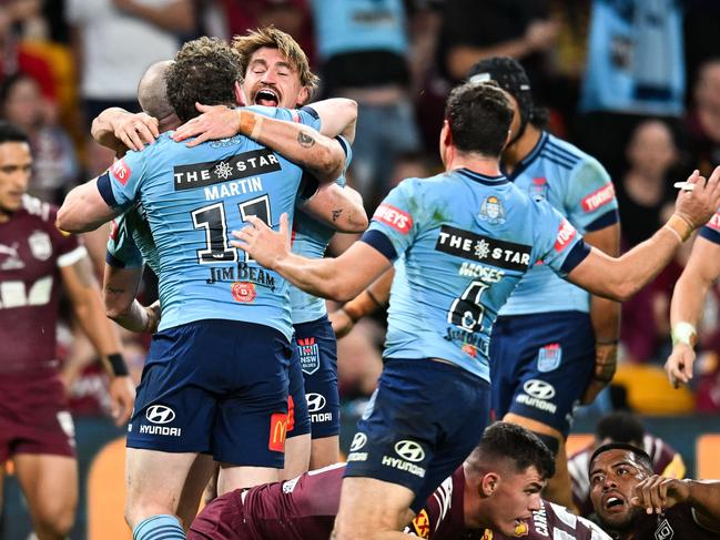 BRISBANE, AUSTRALIA - NewsWire Photos - MAY 28, 2025.NSW Blues player celebrate a try by Dylan Edwards against the QLD Maroons at Suncorp Stadium during game one of the State of Origin series. Picture: Dan Peled / NewsWire