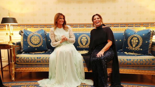 Jenny Morrison and First Lady Melania Trump share a laugh during Saturday’s state dinner. Picture: Adam Taylor