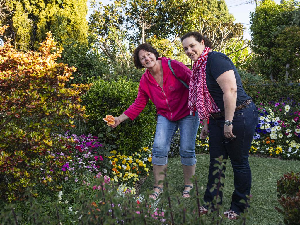 Janelle Haughey (left) and Anne Hayden in The Chronicle Garden Competition City Reserve Grand Champion garden of Cheryl Ganzer during the Carnival of Flowers, Saturday, September 21, 2024. Picture: Kevin Farmer