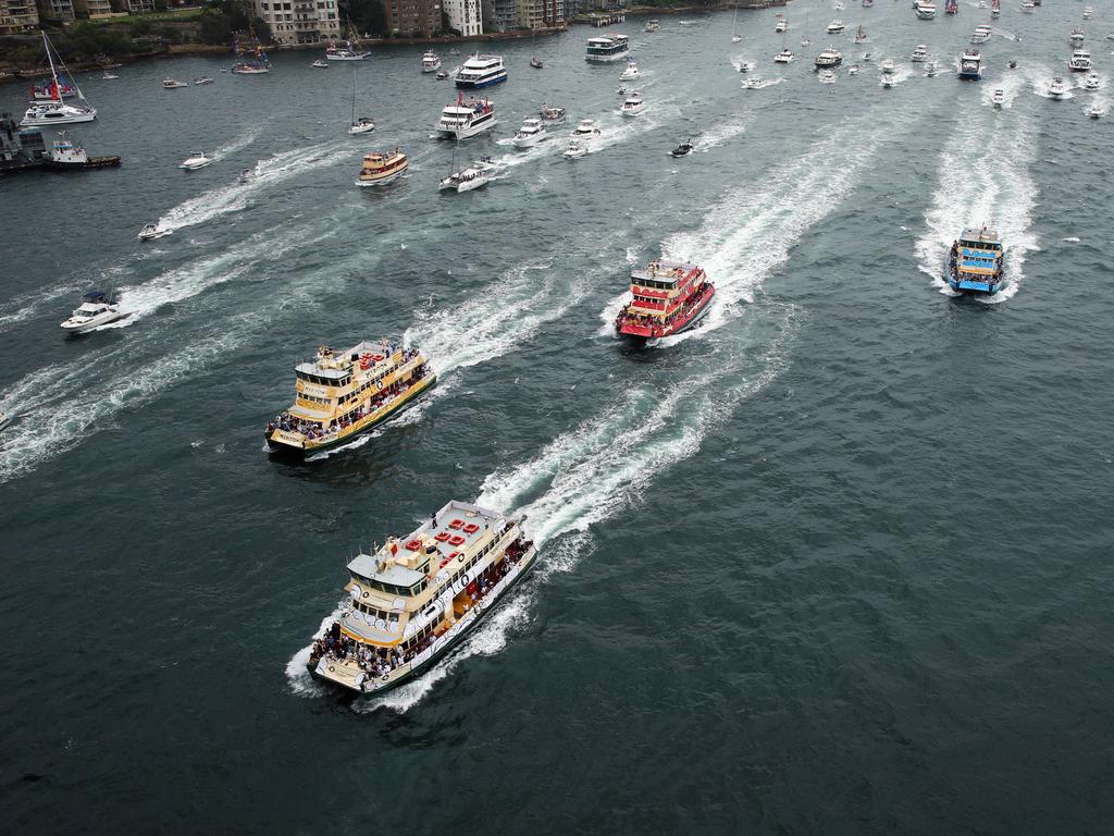 Pictured are ferrys racing during the annual Sydney Ferry Race on Sydney Harbour on Australia Day 2017. Picture: Richard Dobson