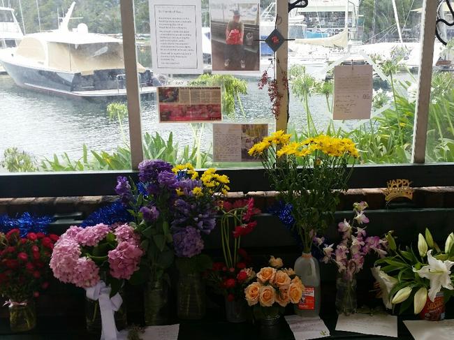 Tributes to beloved Mosman homeless man Ray Johnson at Mosman Bay Wharf.