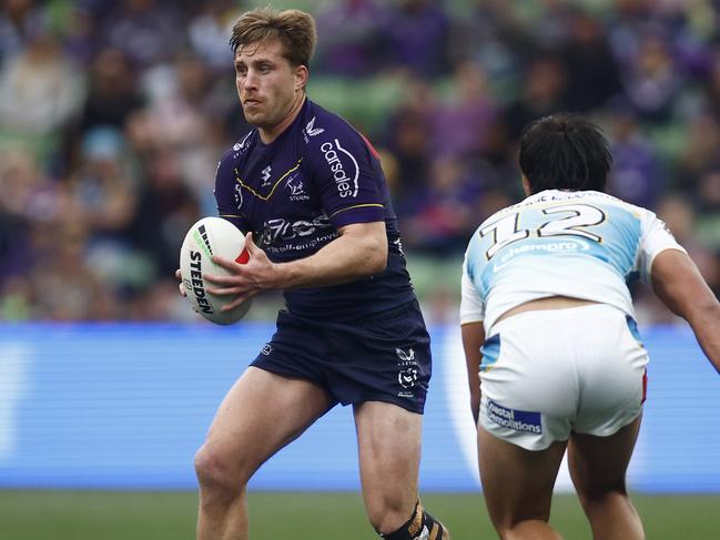 MELBOURNE, AUSTRALIA - AUGUST 26: Cameron Munster of the Storm runs with the ball during the round 26 NRL match between Melbourne Storm and Gold Coast Titans at AAMI Park on August 26, 2023 in Melbourne, Australia. (Photo by Daniel Pockett/Getty Images)