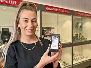 STUNNING: Chloe Fry with a $20,000 diamond ring for sale at the new Angus and Coote which is opening at Orion. Picture: Cordell Richardson