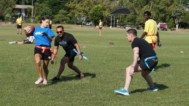 Darwin Middle School students playing Flag Football against United States Marines at DMS, 19 May 2025. Picture: Jason McIntosh