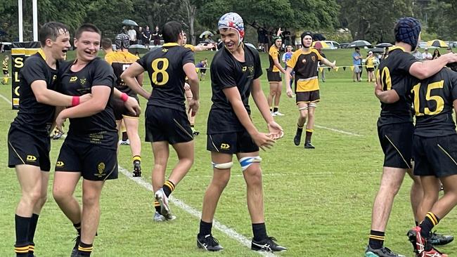 St Laurence's College winger Brody McLaren celebrates his try.