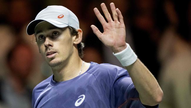 Australian Alex de Minaur waves after winning his men singles tennis match against Italy's Mattia Bellucci on the sixth day of the ATP Tour Rotterdam Open tennis tournament at the Ahoy venue in Rotterdam, on February 8, 2025. (Photo by Sander Koning / ANP / AFP) / Netherlands OUT