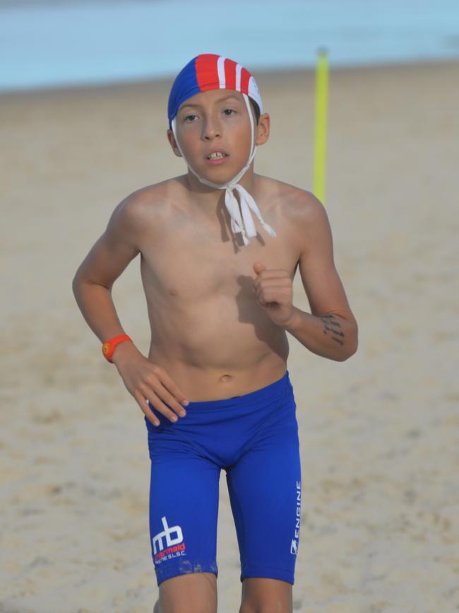 Running action at the Queensland Youth Surf Life Saving Championships on February 17.