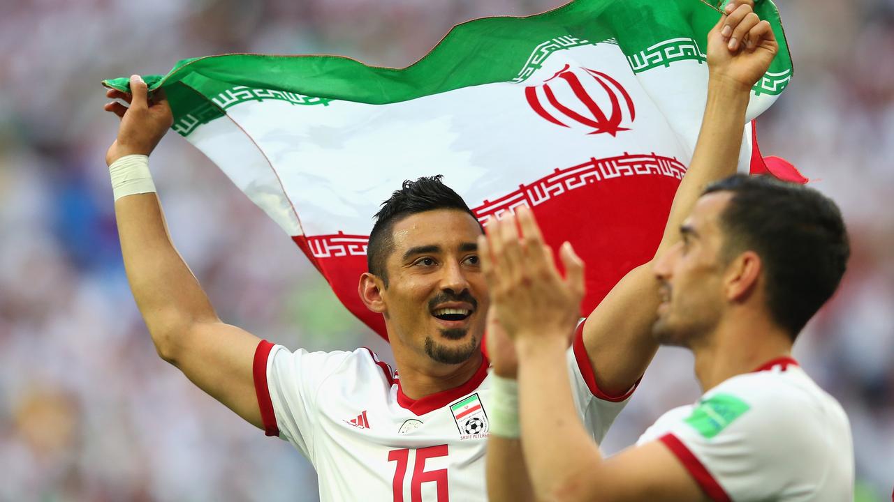 Reza Ghoochannejhad of Iran celebrates