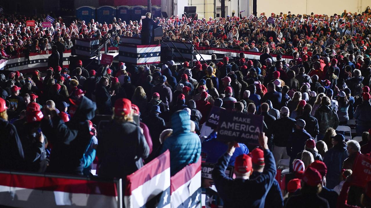 Not much social distancing going on here. Picture: Mandel Ngan/AFP