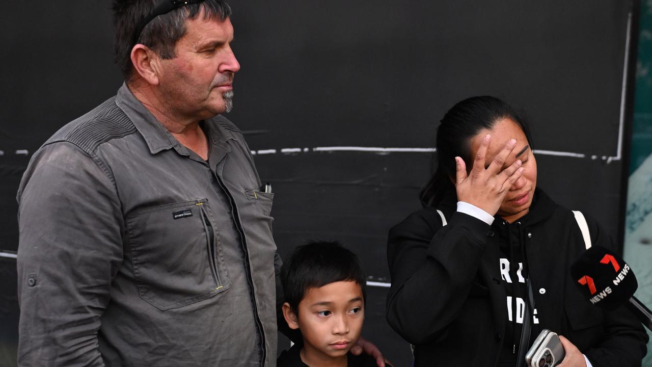 Jim Heinrich greets his wife Marvin and 8yo son Zidane after they were locked in Westfield Marion. Picture: NewsWire / Brenton Edwards