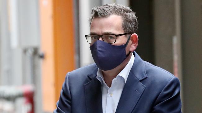 Victorian Premier Daniel Andrews wearing a mask to a press conference. Picture: David Crosling