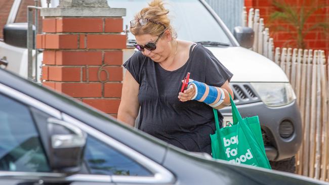 A family friend outside the home of Jacinta Davila’s mum in Mile End home on Friday. Picture: Ben Clark