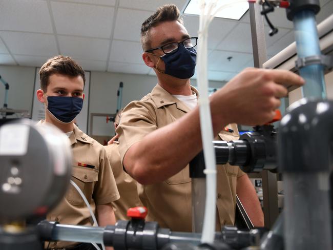 Fireman Cody M. Tompkins, right, and Fireman Matthew D. Brown, students at Naval Nuclear Power Training Command. Picture: U. Navy/ Mass Communication Specialist 1st Class Darren M. Moore