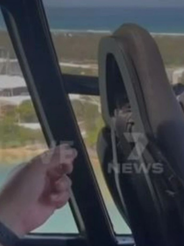 They appear to be pointing at the other helicopter. Picture: 7 News