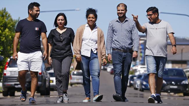 Local families in Riverstone – including (from left) Anil Goyal, Neeraj Duggal, Ahalya Rentala, Ali Ayaz and Muhammad Abbas – are appalled at the lack of infrastructure in their new community after buying homes in the area. Picture: Sam Ruttyn