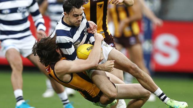 Will Day of the Hawks tackles Brad Close of the Cats. Picture: Michael Klein