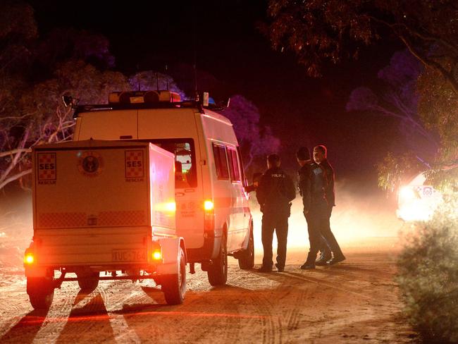 Police and SES teams near the scene of the tragic incident. Picture: Greg Higgs