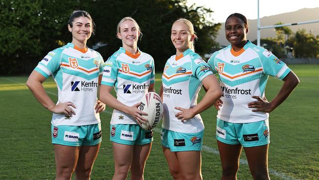 The Northern Pride have unveiled their new playing strip for the club's first women's premiership team, before the start of their maiden QRL premiership season. Northern Pride women's players Paige Schouw, Nadia Windleborn, Brandy Yallop and Rachel Abednego in the team's striking white and teal playing kit ahead of their first premiership match. Picture: Brendan Radke
