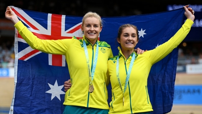 Gold Medalists Jessica Gallagher and Caitlin Ward celebrate with the Australian flag after winning gold in the women's Tandem B Sprint. Picture: Justin Setterfield/Getty Images