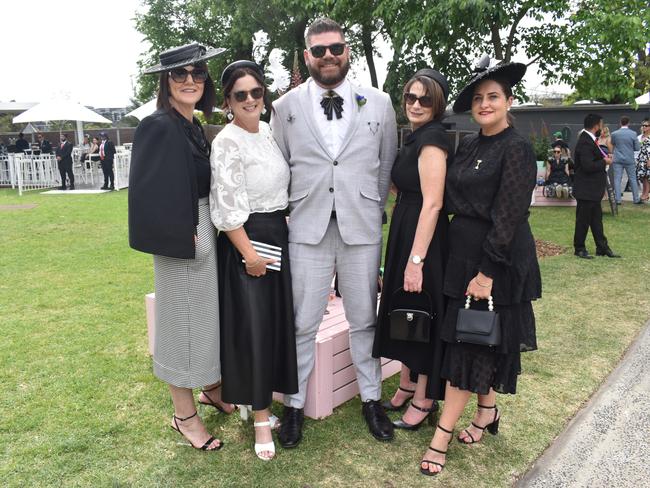 Guests in striking racewear at Penfolds Derby Day at the Flemington Racecourse on Saturday, November 02, 2024: Gaylene Thomas, Madonna Archibald, Keaton Williams, Julie Thomas and Semone Yelaska. Picture: Jack Colantuono