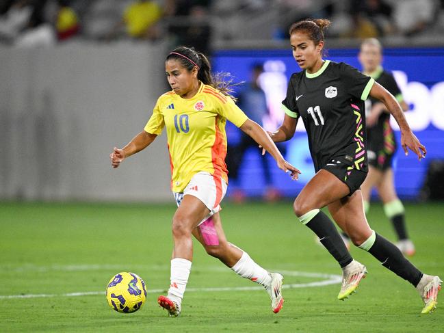 Mary Fowler in pursuit of Colombia’s Leicy Santos during the Matildas’ loss. Picture: Getty Images via AFP