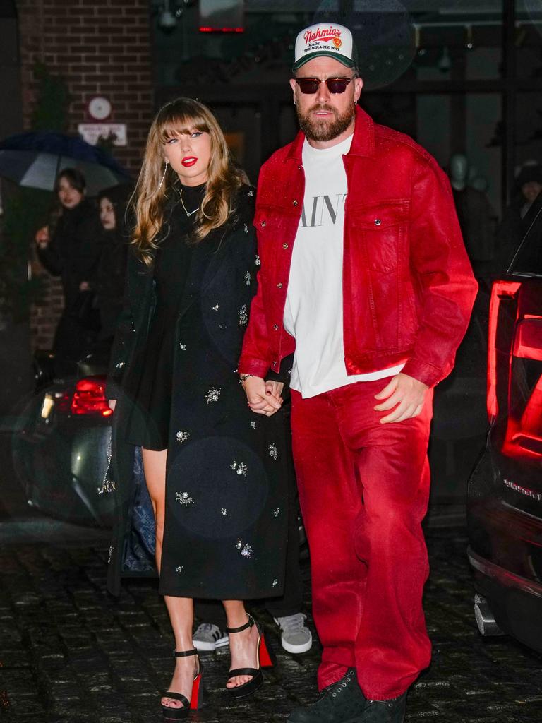 Taylor Swift and Travis Kelce, catching strays. Picture: XNY/Star Max/GC Images