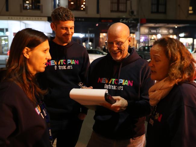 Elaine Macnish and volunteers Lee Coleman, Jim Lowe and Sue Byrne taking notes after speaking with some rough sleepers on King St in Newtown. Engaging with and supporting people experiencing homelessness has inspired the participants to advocate for a more “inclusive and just community”. Picture: Jonathan Ng