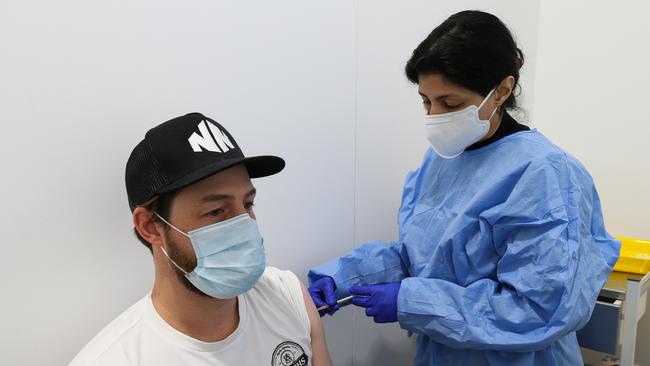 Gus Magee gets the Covid-19 vaccine at the Roseville Vaccination centre in Sydney. Picture: NCA Newswire /Gaye Gerard