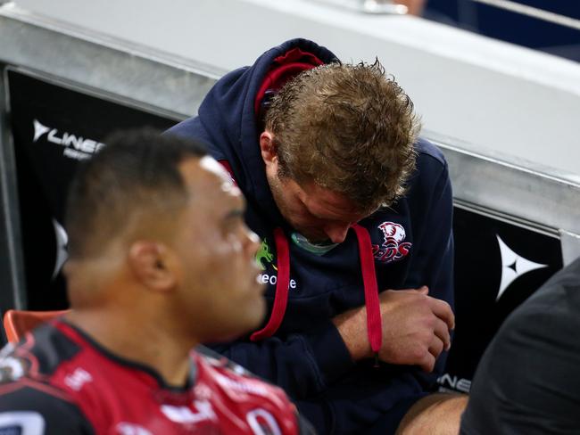 James Slipper sits injured on the bench during the Super Rugby game, Reds V Chiefs at Suncorp Stadium in Brisbane. Pics Adam Head