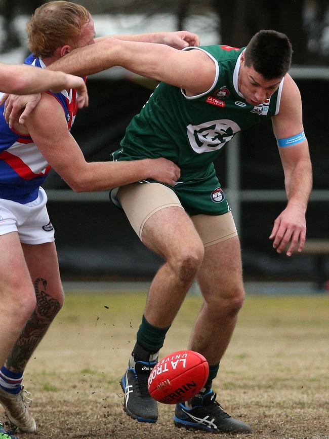 NFL: Matthew Kreuzer hunts the ball for Greensborough. Picture: Hamish Blair