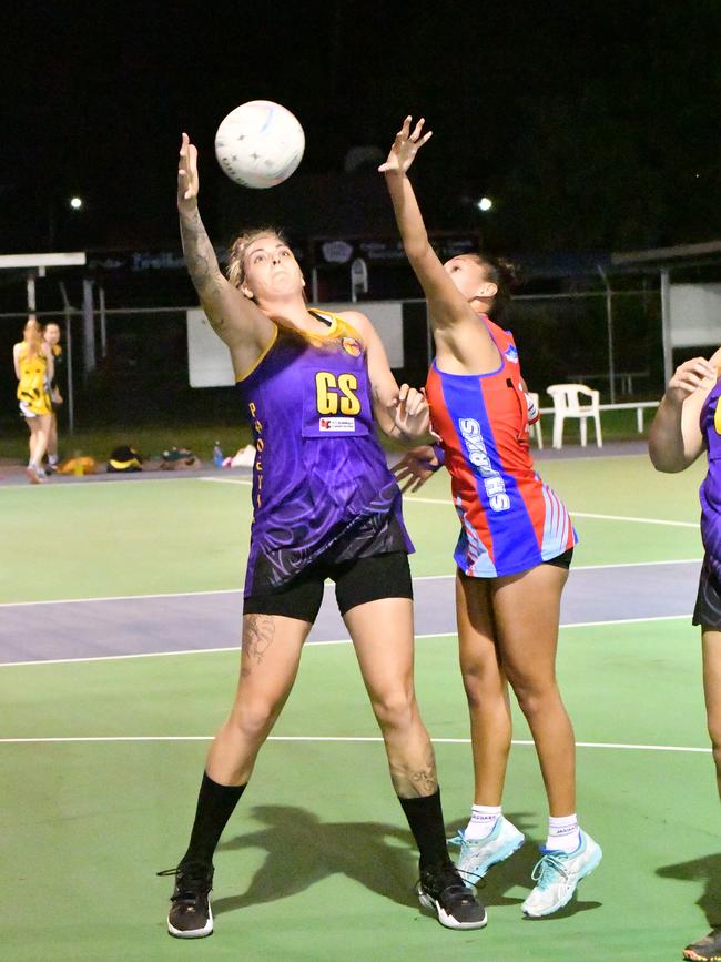 Action from the opening round match of Cairns Netball’s Senior Division 1 competition between Sharks and Phoenix Fierce. Fierce’s Cayla George and Sharks’ Michaela Kadlecek battle for possession. Picture: Vilimone Baleilevuka/Vili Photography