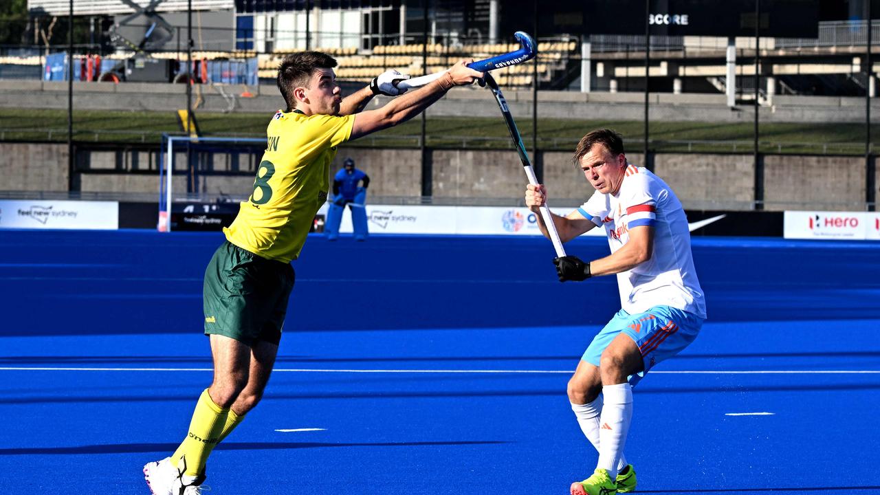 Australia's Davis Atkin (L) controls the ball during the men's field hockey match between Australia and the Netherlands in the FIH Hockey Pro League in Sydney. Photo: AFP