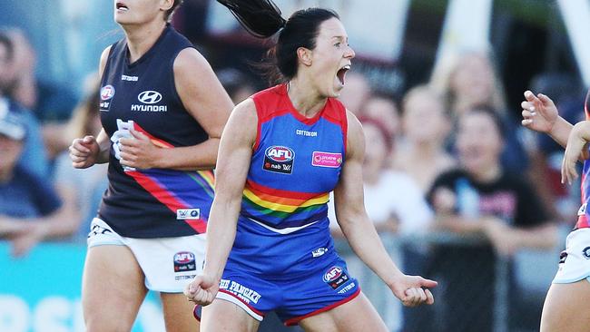 MELBOURNE, AUSTRALIA - FEBRUARY 23:  Brooke Lochland of the Bulldogs celebrates a goal during the round four AFLW match between the Western Bulldogs and the Carlton Blues at Whitten Oval on February 23, 2018 in Melbourne, Australia.  (Photo by Michael Dodge/Getty Images)