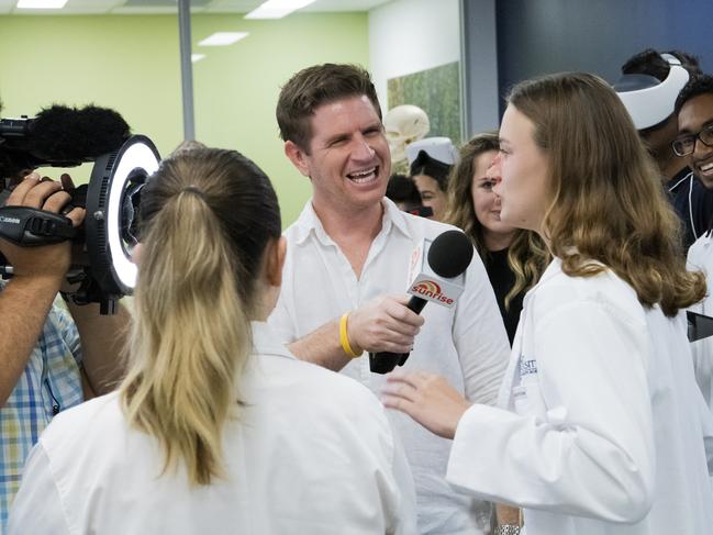 Sunrise weatherman Sam Mac with students at Bond University.  Picture: Cavan Flynn/Bond University.