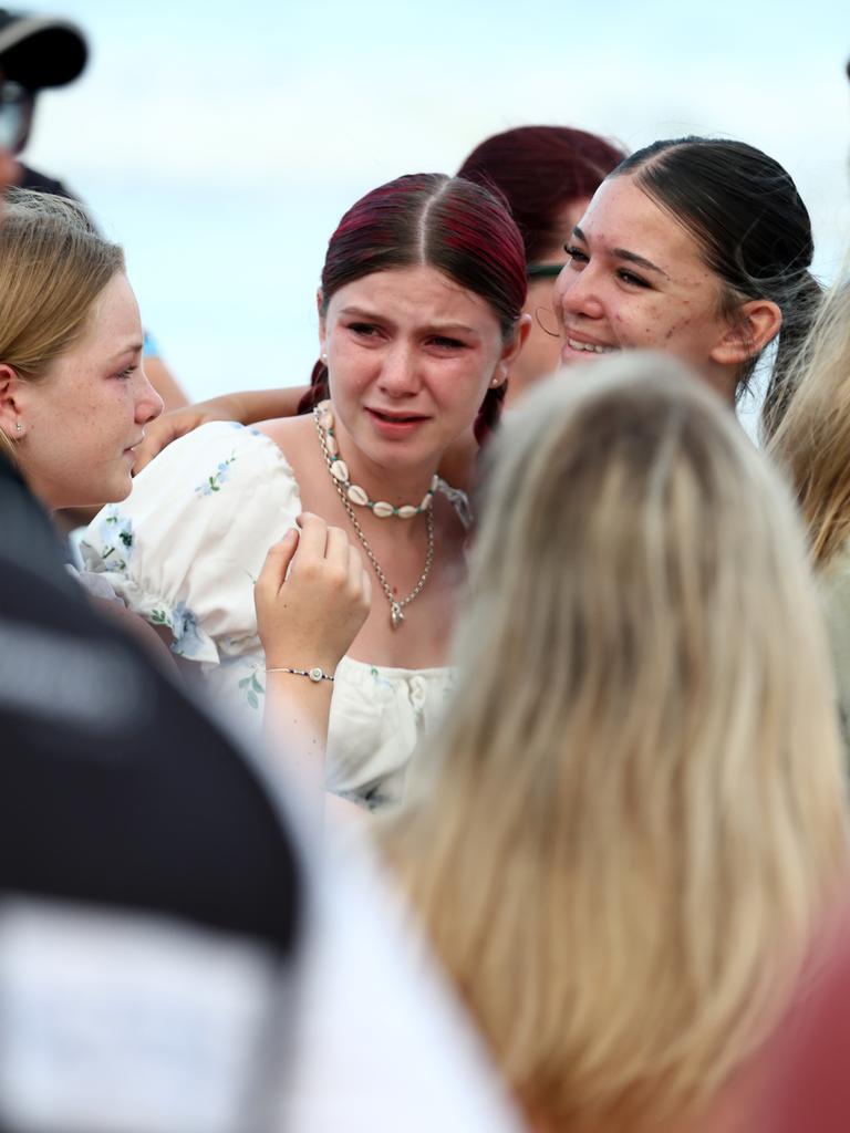 Hundreds of people have gathered at Bribie Island for a vigil to honour 17-year-old shark attack victim Charlize Zmuda. Picture: David Clark