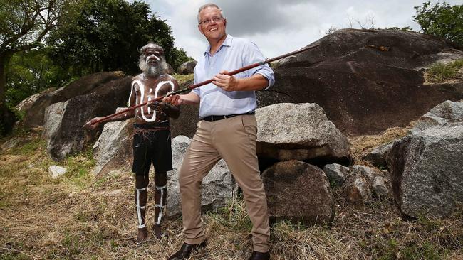 The Prime Minister at a recreation of the act of reconciliation between Captain James Cook and the indigenous people at Reconciliation Rock in Cooktown.