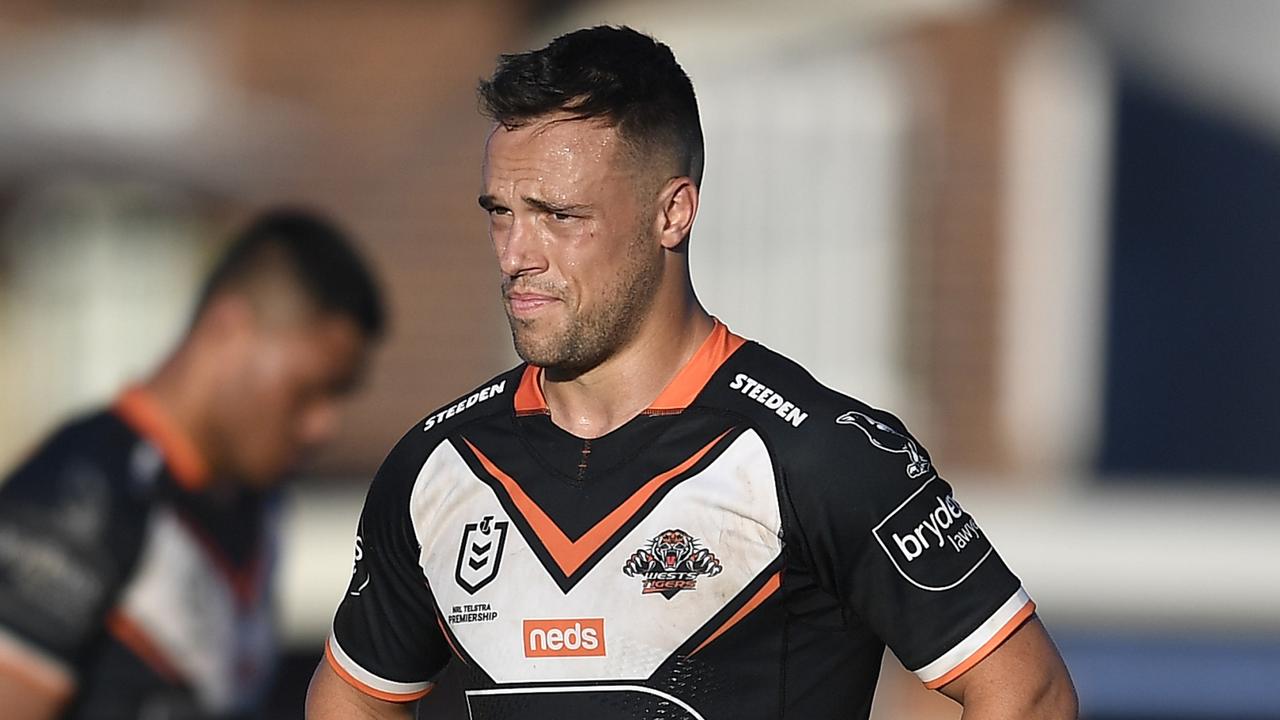 ROCKHAMPTON, AUSTRALIA - AUGUST 21: Luke Brooks of the Tigers looks dejected after losing the round 23 NRL match between the Wests Tigers and the Cronulla Sharks at Browne Park, on August 21, 2021, in Rockhampton, Australia. (Photo by Ian Hitchcock/Getty Images)