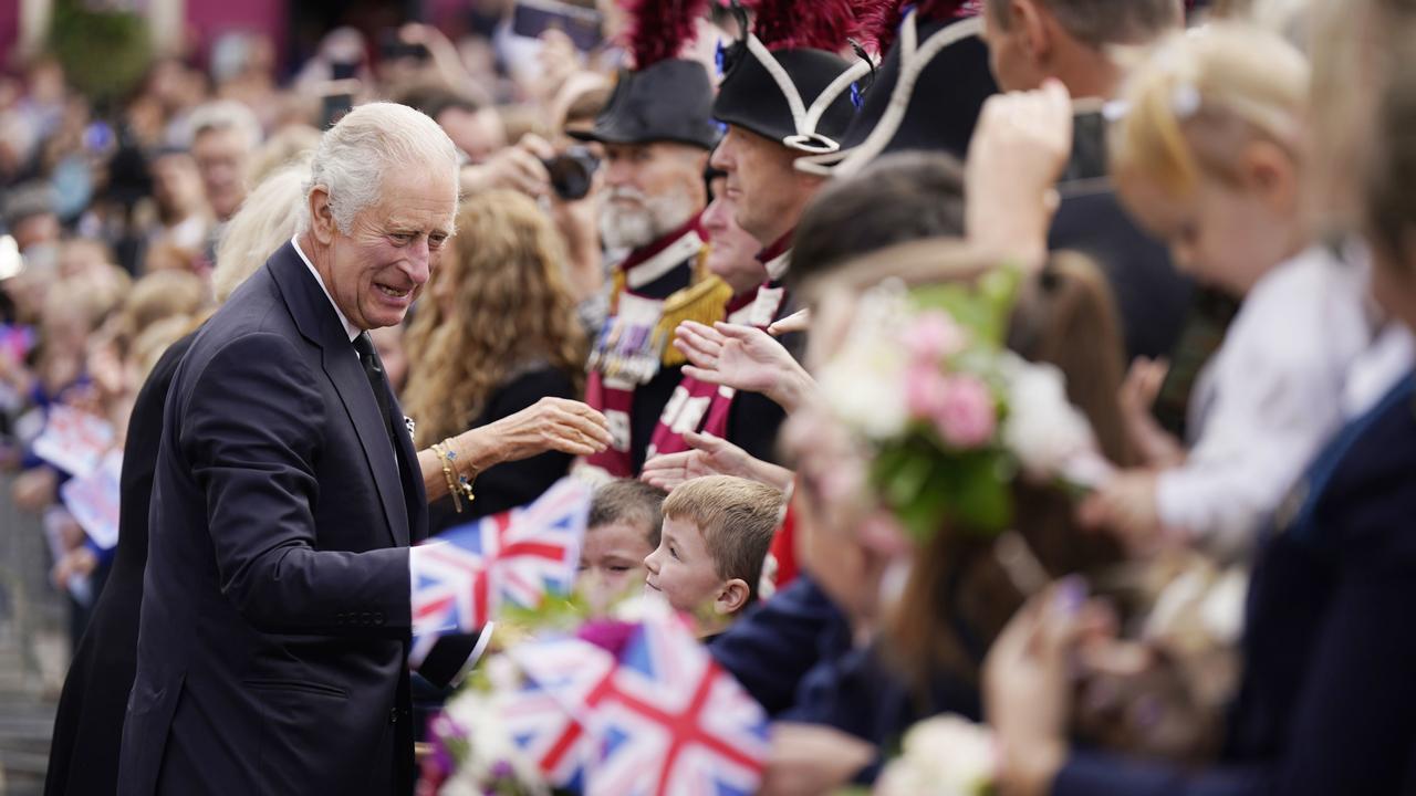 Crowds cheer as King Charles III and Camilla, Queen Consort, arrive for a visit to Hillsborough Castle. Picture: Niall Carson - WPA Pool/Getty Images