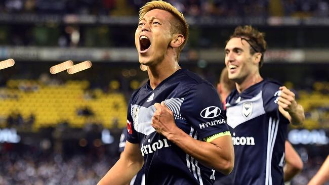 Keisuke Honda celebrates his goal for Victory. Picture: AFP Photo