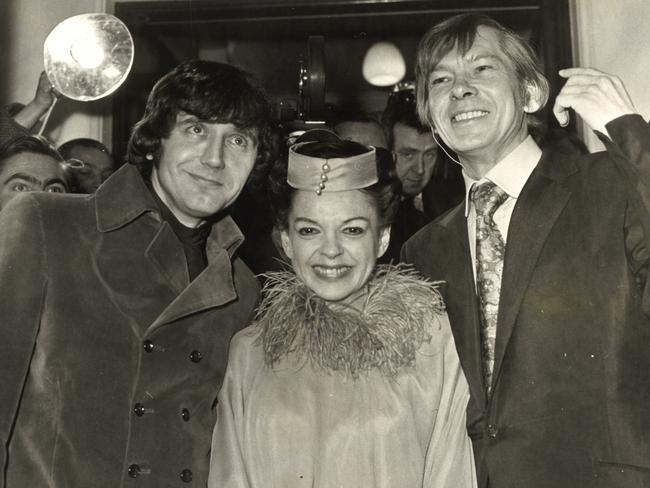 Judy Garland with (left) new husband Mickey Deans and their best man, singer Johnny Ray, after their wedding in 1969.