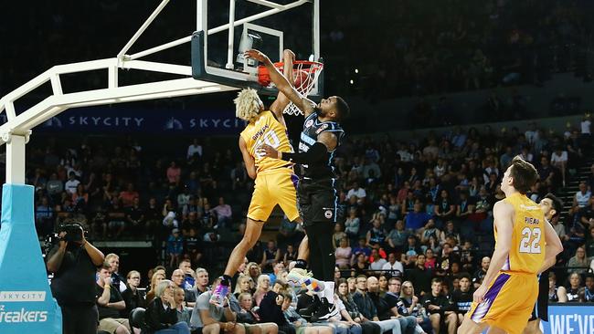 Brian Bowen puts Patrick Richard on the poster. Picture: Getty