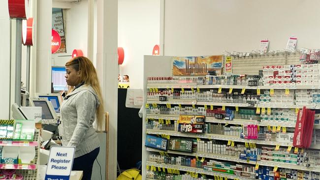 CVS currently sells cigarette behind its counter. It will phase them out by October. Picture: AFP.