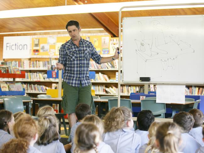 Illustrator Tom Jellett shares the ins and outs of constructing books with Belrose Primary School students who won a category in the 2018 Premier’s Reading Challenge NewsLocal Words and Art Competition. Picture: Tim Pascoe.